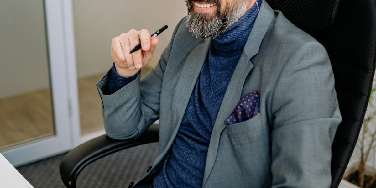 A confident business leader presents a strategic plan, embodying the proactive approach needed for AI imaging compliance.