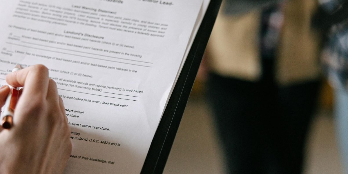 A professional carefully reviewing a checklist, ensuring compliance for AI tools.