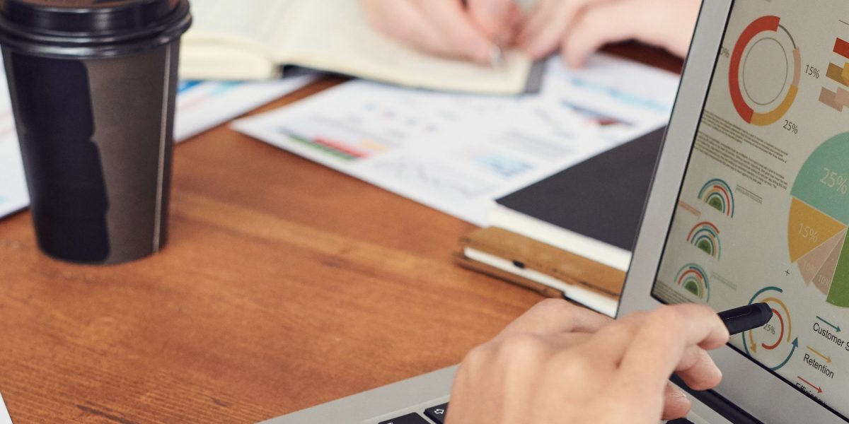 A marketing team collaborates, analyzing results from AI-driven A/B tests to refine campaigns.