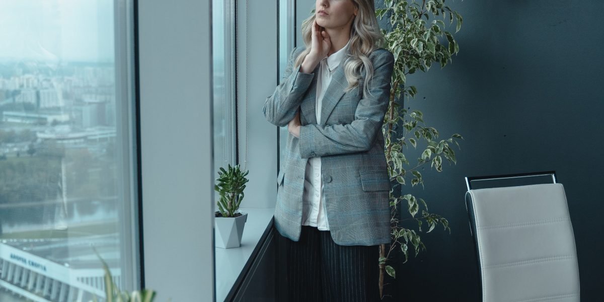 A thoughtful business leader pondering the complex and rapidly changing landscape of AI regulations and their impact.