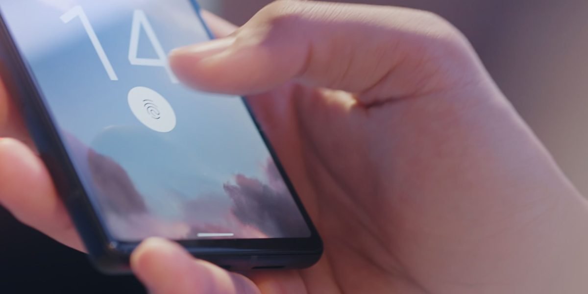 A person quickly and securely unlocks their smartphone using facial recognition technology for everyday convenience.