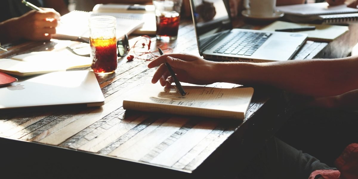 A dynamic startup team collaborating, reflecting the innovative spirit and investment trends fueled by LLM AI advancements.