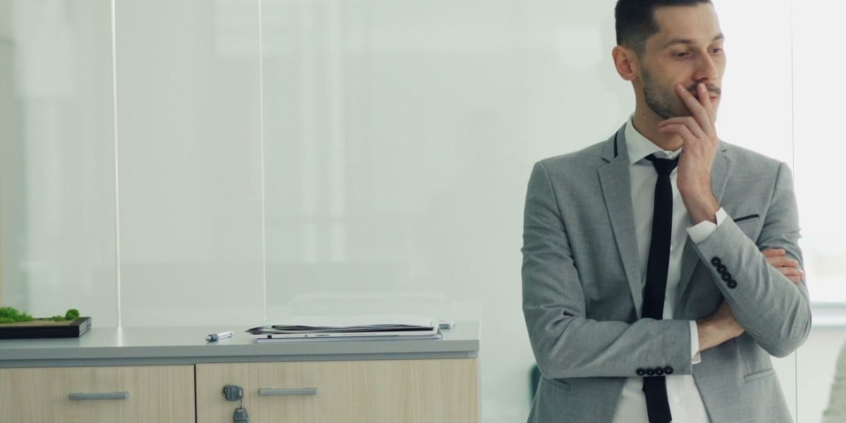 A startup founder contemplating innovative solutions and navigating complex regulatory landscapes from the outset.