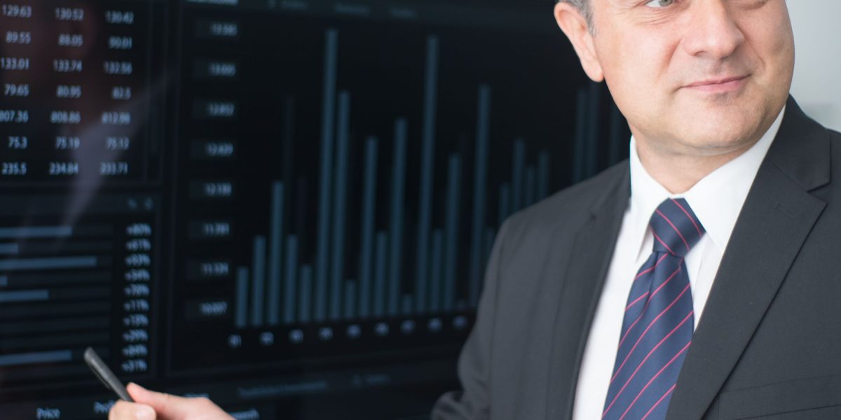 A business leader carefully navigating complex decisions, symbolizing the strategic importance of regulatory understanding.