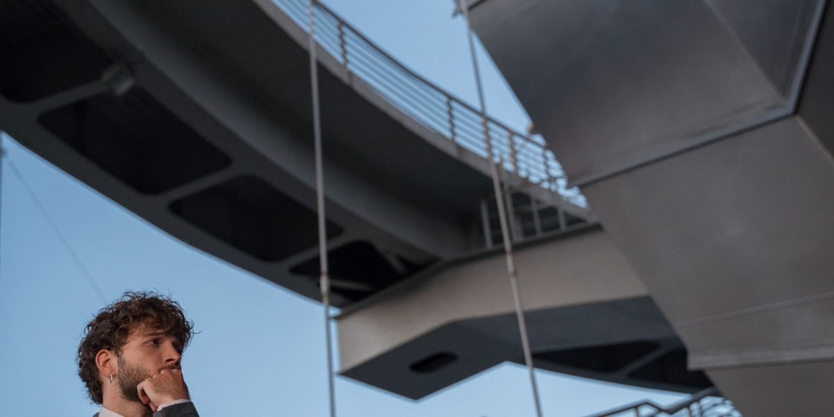A visionary leader looking towards the horizon, symbolizing foresight and proactive planning for future regulations.