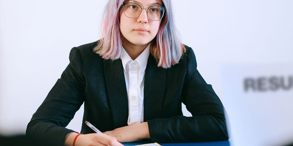 A professional interview setting, capturing the process of evaluating a candidate's expertise.