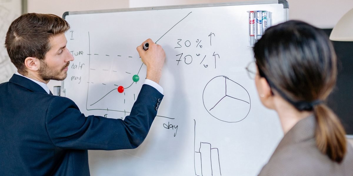 Executives engaged in a high-level discussion, planning future growth and mitigating risks.