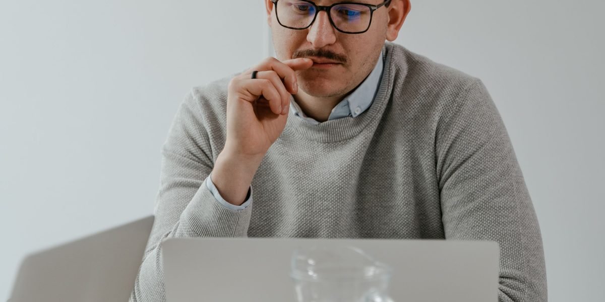 Professionals diligently reviewing potential failure modes and ethical harms associated with AI systems.