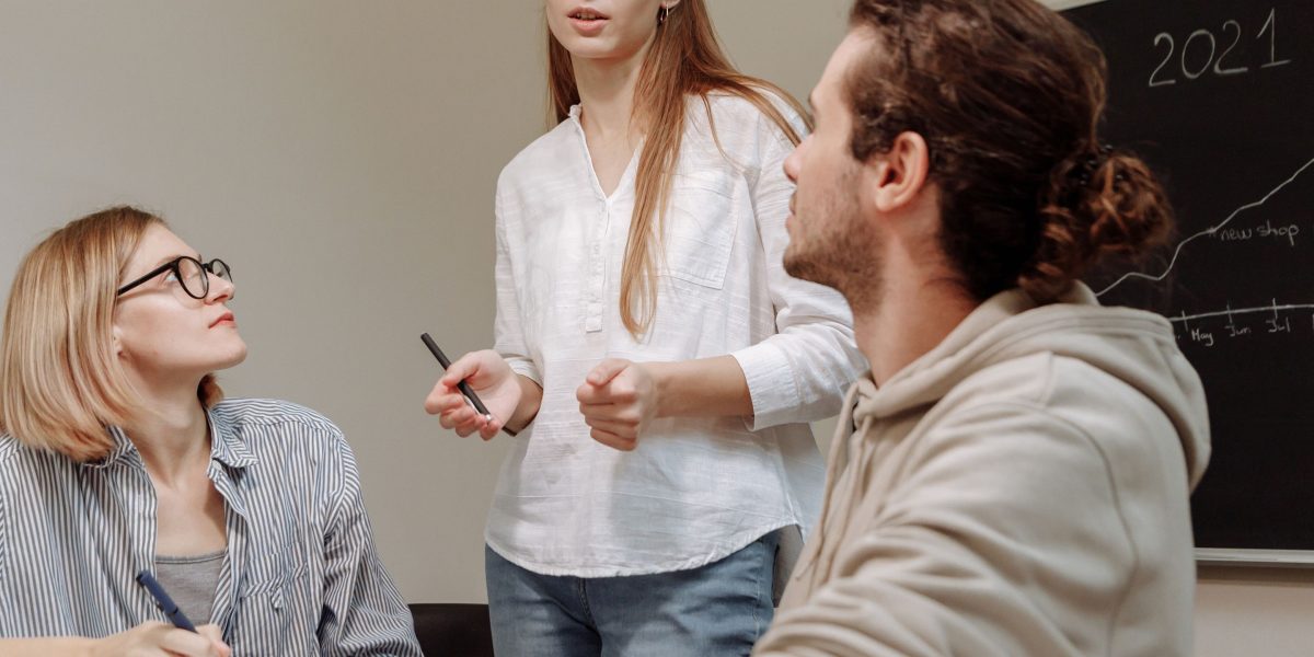 A leader confidently presents future regulatory directions, emphasizing proactive strategy and horizon scanning.