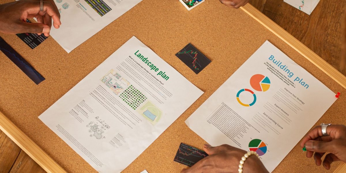 A diverse team works together, integrating compliance requirements directly into product design from the initial stages.