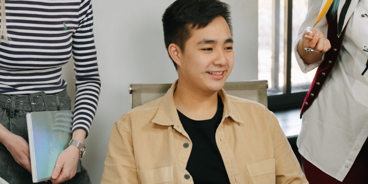 A diverse team engages in a collaborative discussion, strategizing how to integrate different types of AI agents into their business operations.