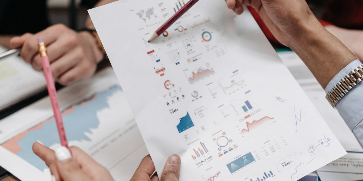 A diverse team collaborating in an office, symbolizing the human expertise required for AI projects.