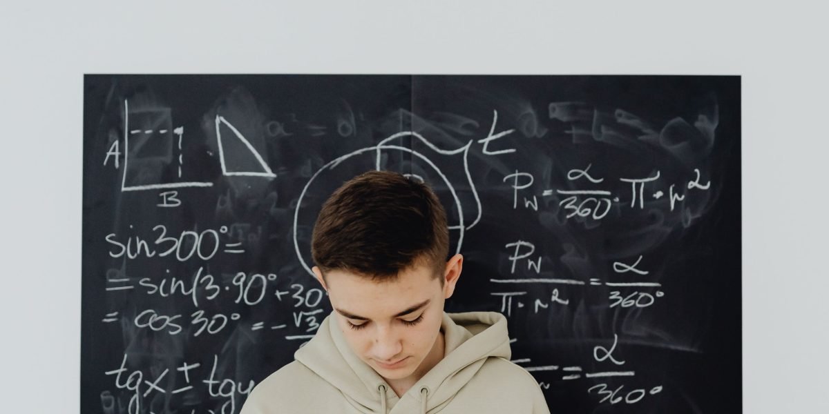 A person with a thoughtful expression, focused intently on a complex problem or document, seeking clarity.